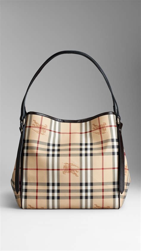 burberry mother company|burberry handbags official website.